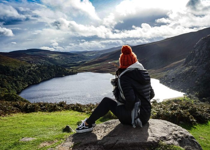Woman seated at the Wicklow mountains