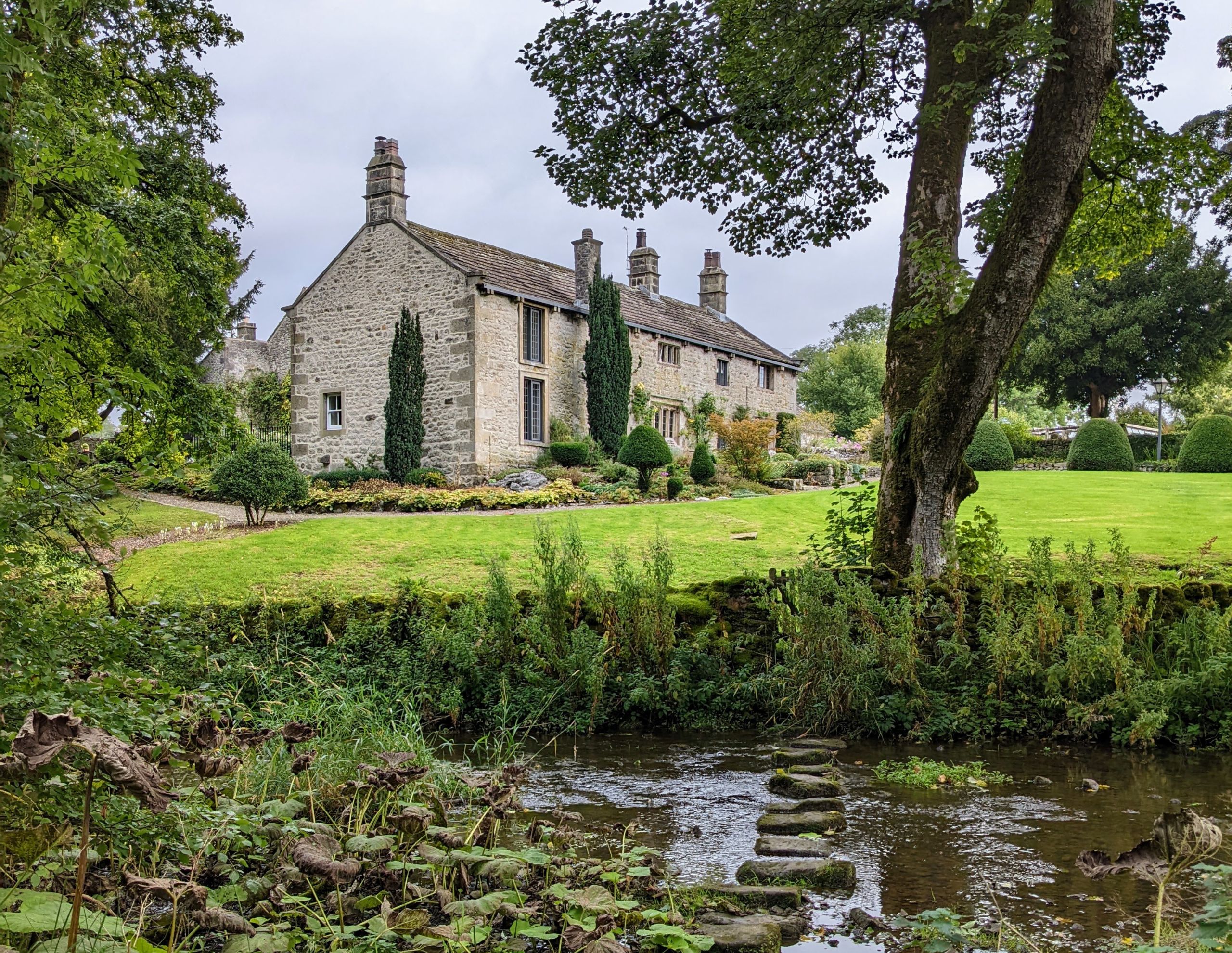 English country house and pond